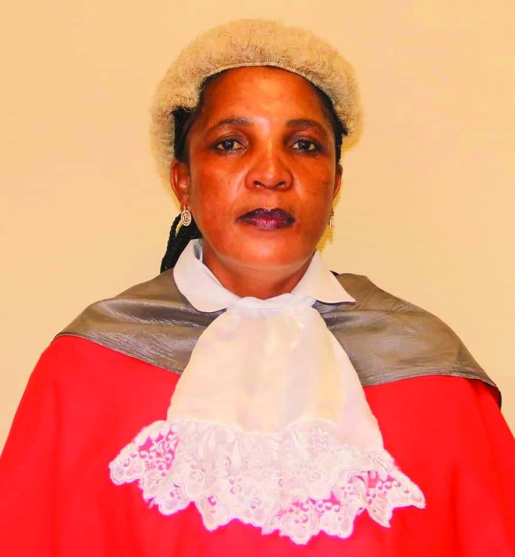 Justice Tau